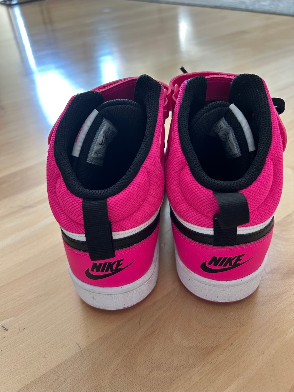 Nike High-Top Sneakers in Black, White & Hot Pink - Picture 3 of 6
